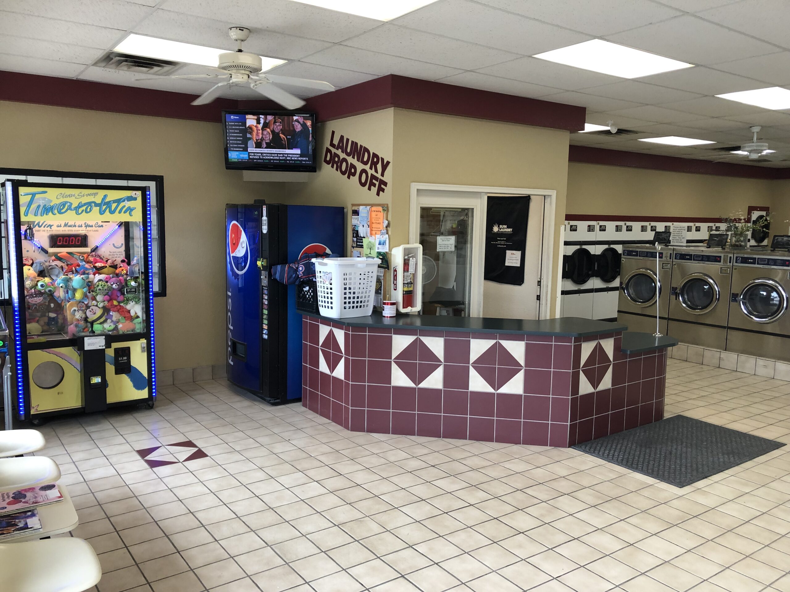 Drop-off counter, arcade and TV at Sun Laundry Hartland Drop-off counter, arcade and TV at Sun Laundry Hartland