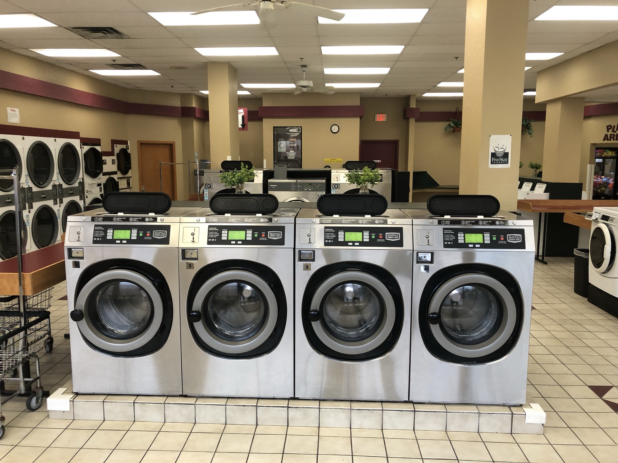 Row of front-load washers at Sun Laundry Oconomowoc